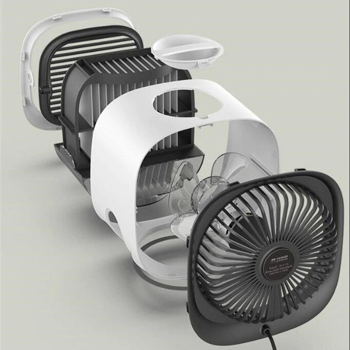 Stijlvolle witte mini airco met bevochtiger, een draagbare oplossing voor verkoeling deze zomer.