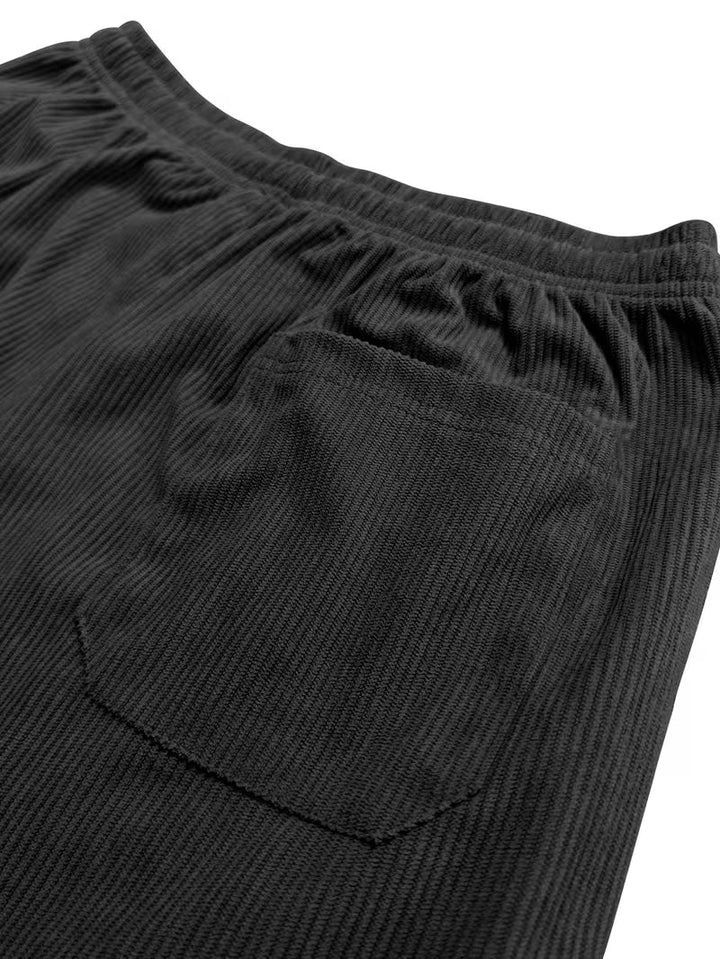 Trendy heren corduroy broek: losse pasvorm, rechte pijpen, combineert mode met comfort voor elke gelegenheid.