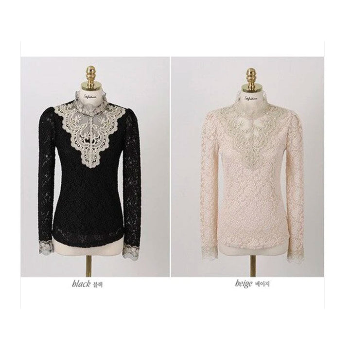 Stijlvolle damesblouse met borduurspitze en kanten accenten. Een elegante top voor elke gelegenheid.