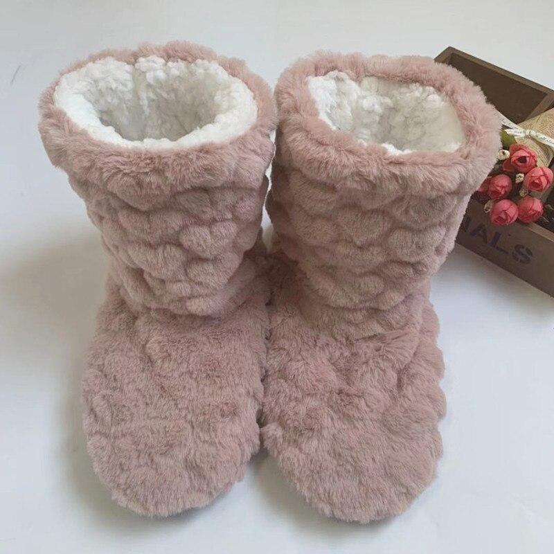 Comfortabele hoge pantoffels voor dames, ontworpen voor optimale warmte binnen.