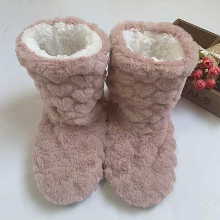 Comfortabele hoge pantoffels voor dames, ontworpen voor optimale warmte binnen.