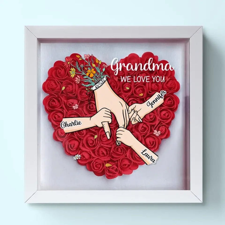Fotolijst met gepersonaliseerde bloemen en naam. Een mooi jubileumcadeau voor een speciale mama.