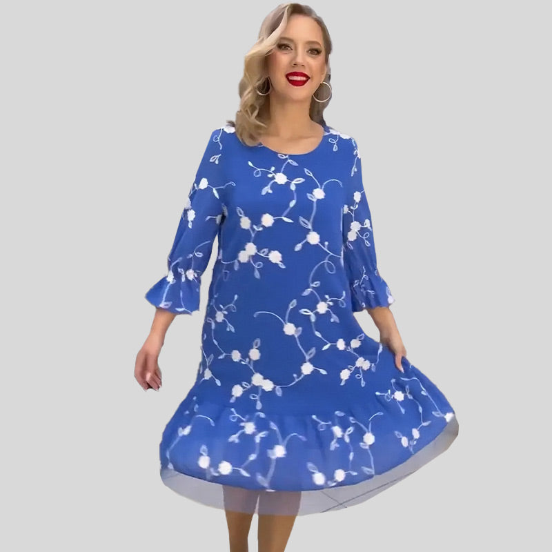 Veelzijdige blauwe midi zomerjurk dames met 3/4 mouw. Perfect voor een tijdloze, comfortabele lentedag.