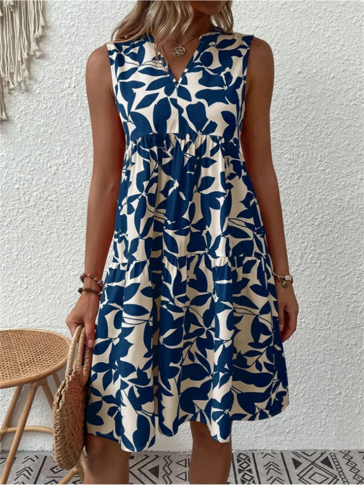 Zomerse A-lijn midi jurk met vrolijke bloemenprint, een must-have voor de vrouw die comfort zoekt.