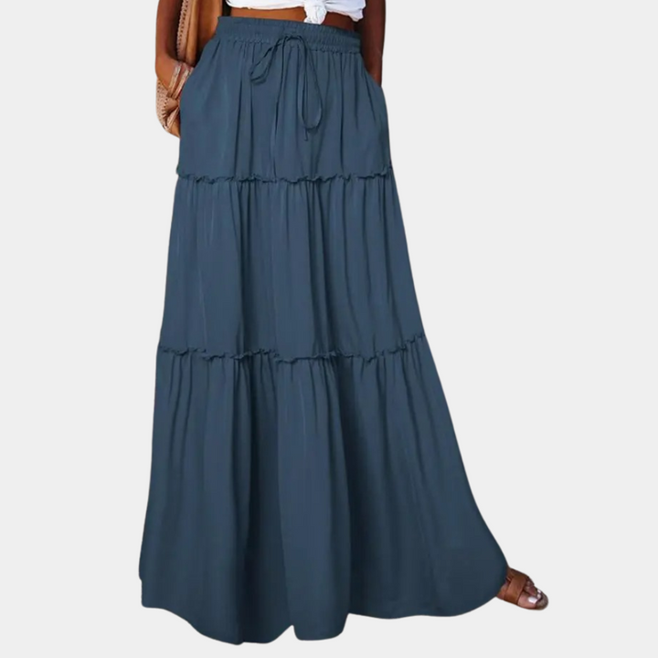 Kleurrijke bohemian hippie maxi rok voor dames, met zwierige pasvorm ideaal als casual zomerrok.