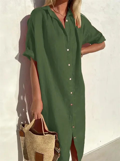 Dames blouse jurk in midi lengte met volledige knoopsluiting aan de voorzijde, ideaal voor de zomer.