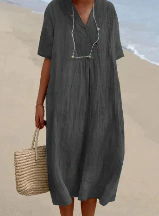 Dameskleding: elegante midi zomerjurk, comfortabel en veelzijdig, met verfijnde look.