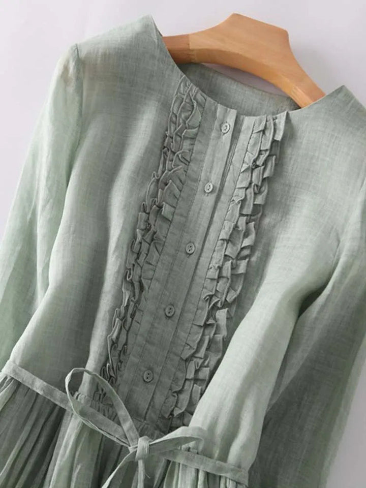 Witte elegante midi zomerjurk voor dames, luchtig en stijlvol, perfect voor warme dagen.