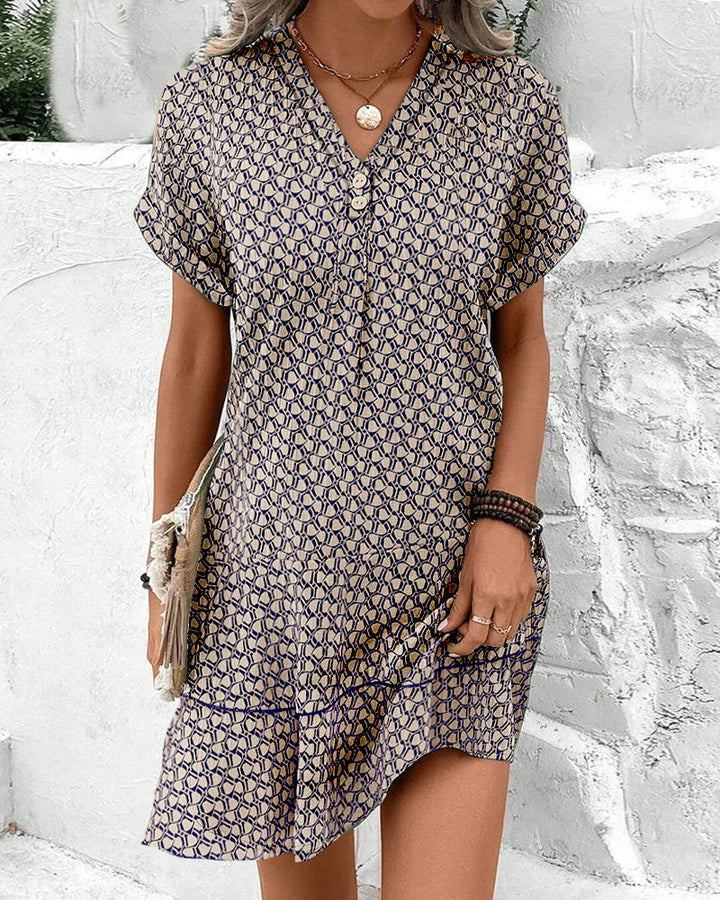 Dames casual zomerjurk met V-hals, print en korte mouwen, perfect voor strand of lente.