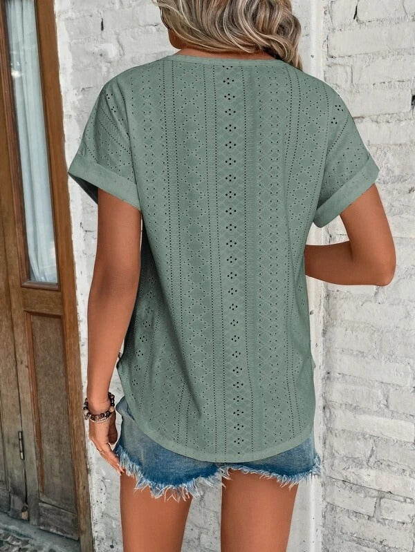 Stijlvol dames t-shirt met oogjespatroon, comfortabel en modieus voor zomerse dagen met korte mouwen.