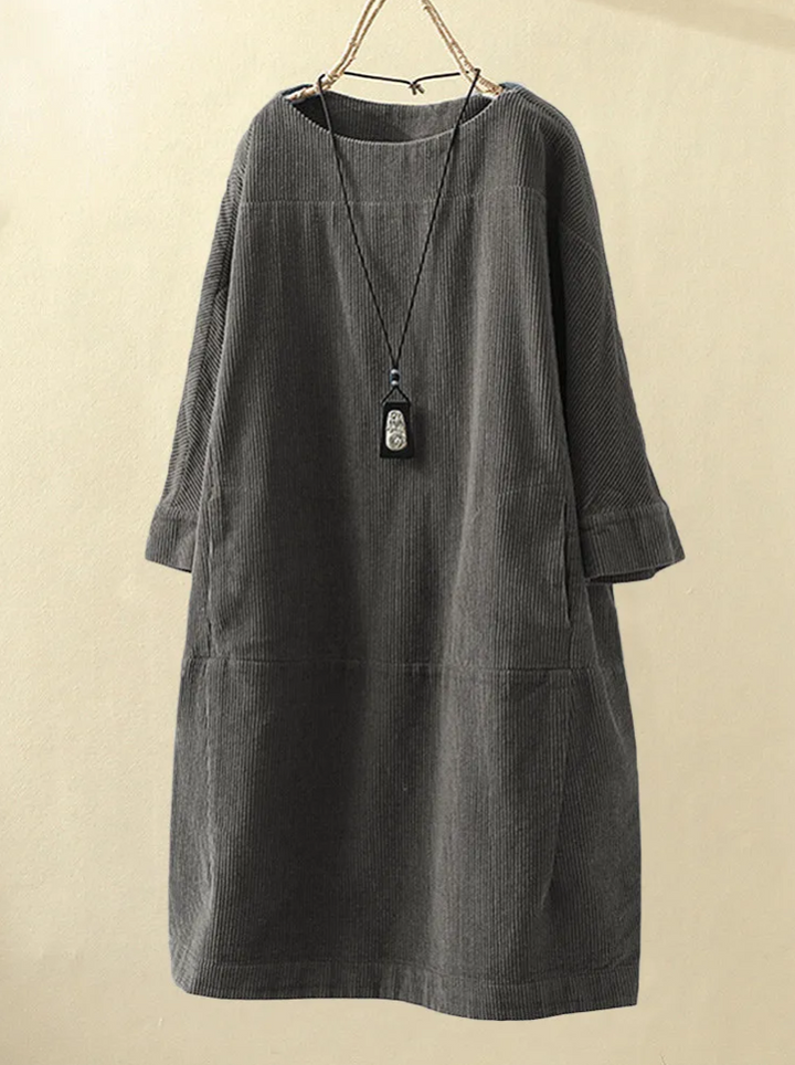 Casual dames midi jurk met korte mouwen, comfortabel en stijlvol voor warme zomerdagen.