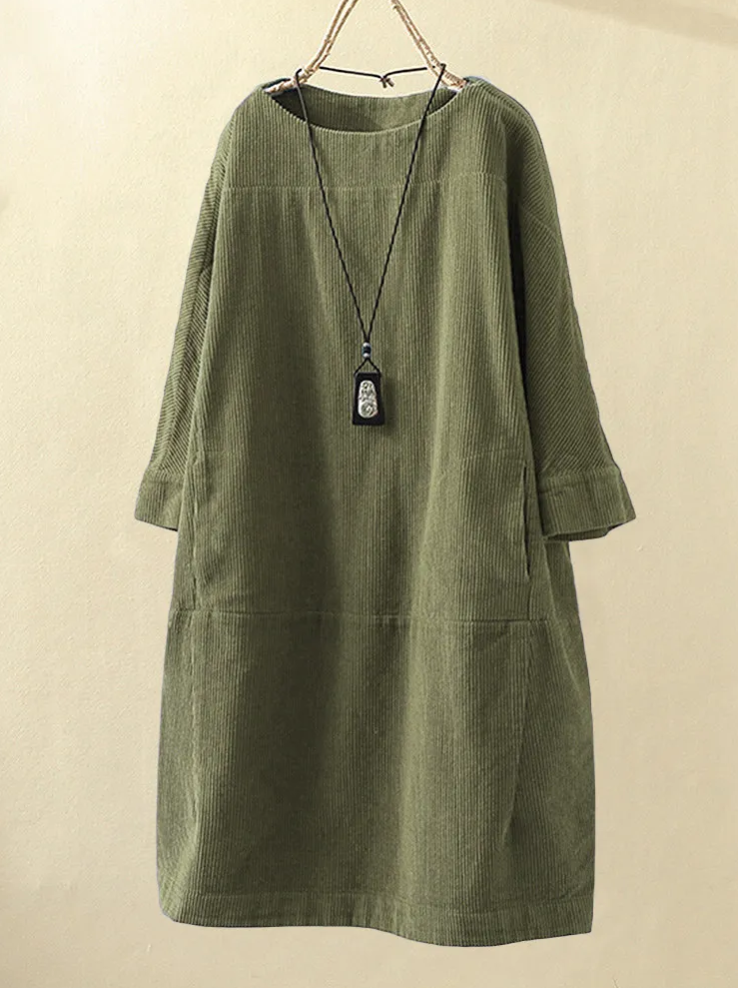 Comfortabele en veelzijdige midi damesjurk, perfect voor zomerse dagen, casual of elegant te dragen.