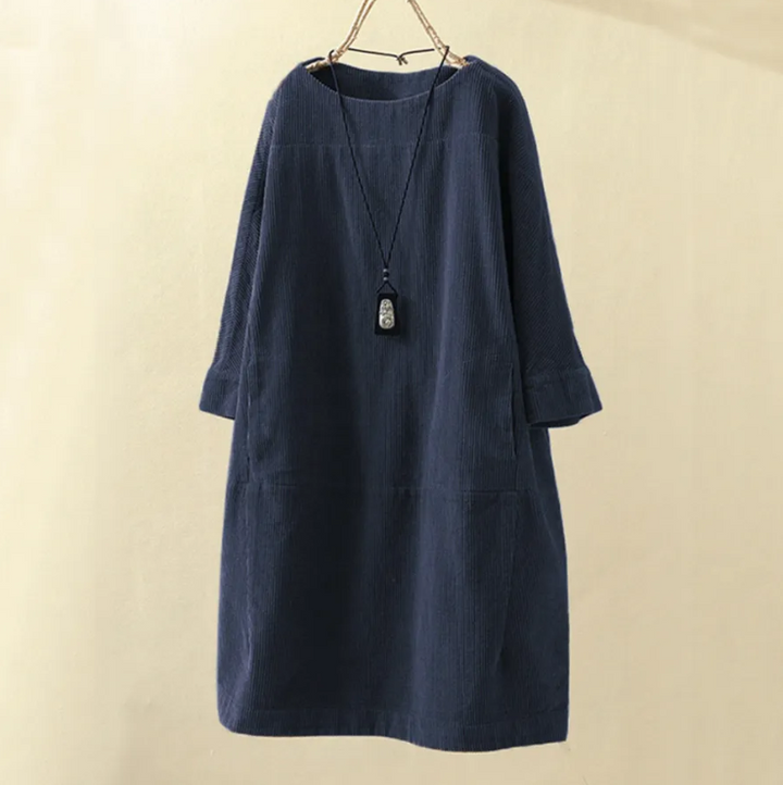 Stijlvolle en comfortabele dames midi zomerjurk, A-lijn model met korte mouwen en o-hals.
