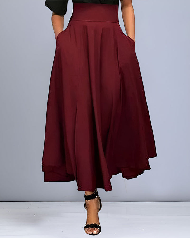 Elegante lange dames rok met hoge taille, perfect voor een stijlvolle en moderne outfit.