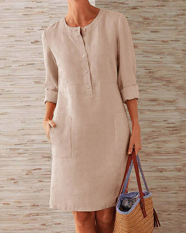 Dames zomerjurk met elegante 3/4 mouwen en een flatterende A-lijn pasvorm. Perfect voor warme dagen.