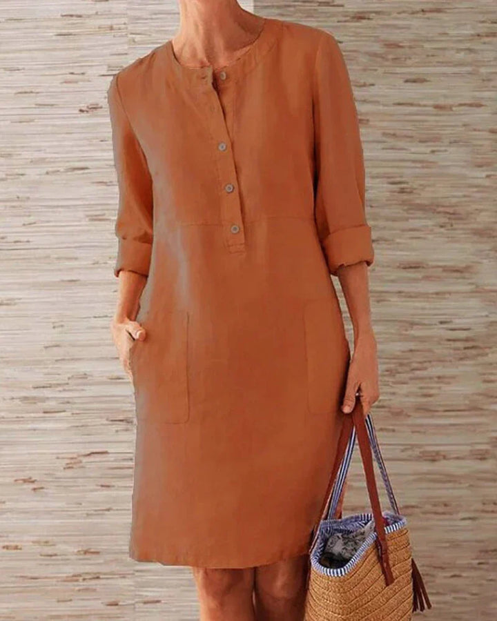 Deze elegante dames zomerjurk heeft 3/4 mouwen en een A-lijn silhouet, comfortabel en chique.