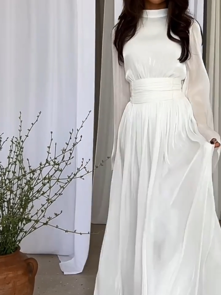 Elegante dames maxi jurk met strikceintuur; perfect voor feesten, gala's of zomeravonden.
