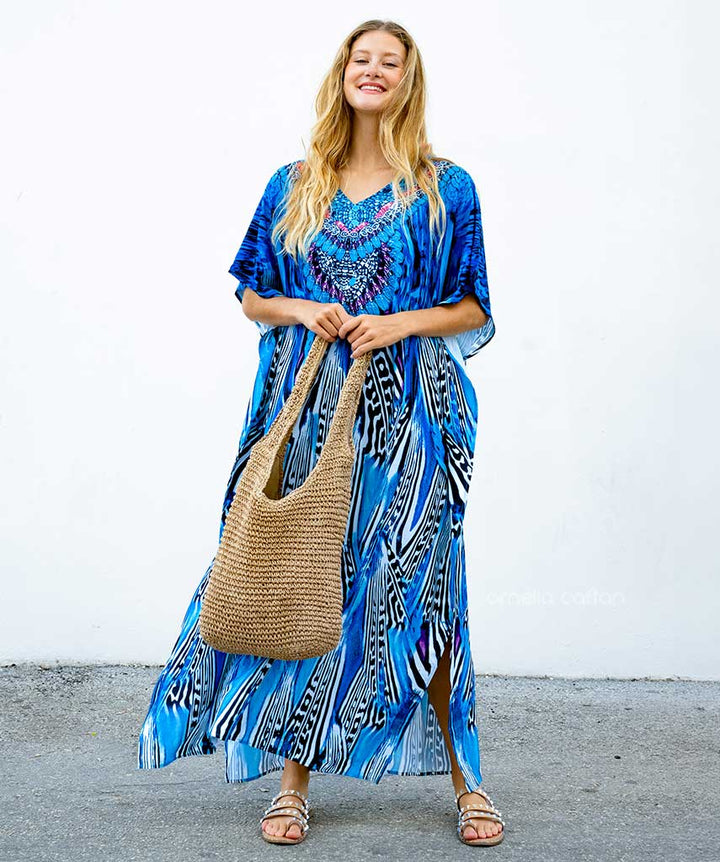 Elegante dames maxi jurk Salve, bohemian stijl met levendige bloemenprint voor zomerse gelegenheden.
