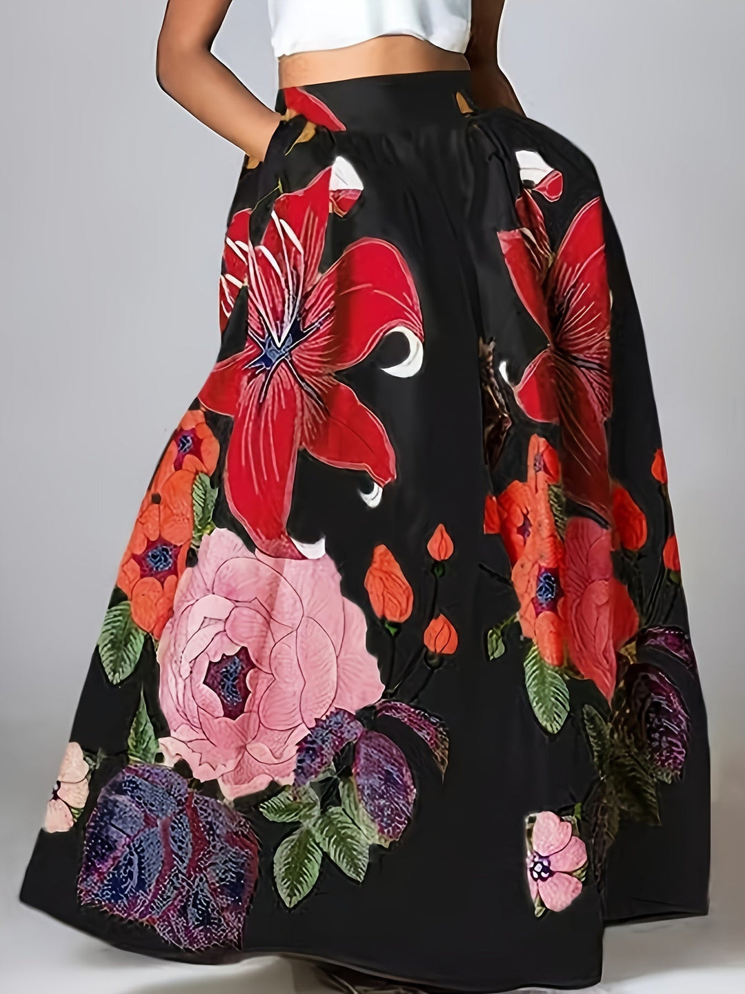 Comfortabele hoge taille dames maxirok met elegante bloemenprint en zakken, ideaal als zomerrok voor vrouwen.