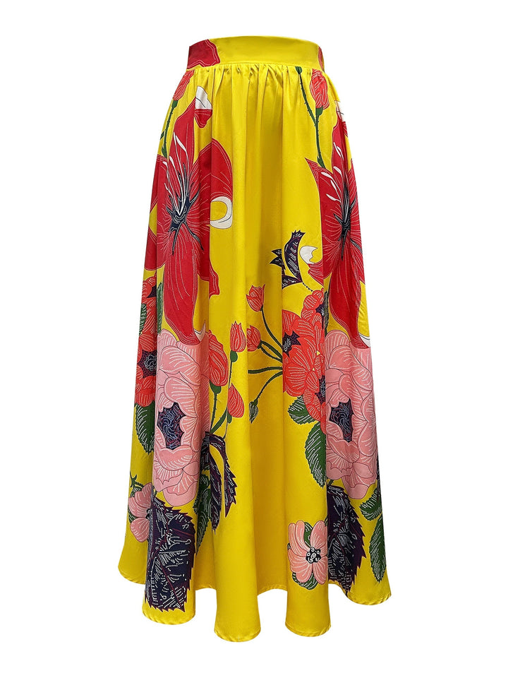 Elegante dames hoge taille maxirok met gele en zwarte bloemenprint, comfortabel en stijlvol voor de zomer.