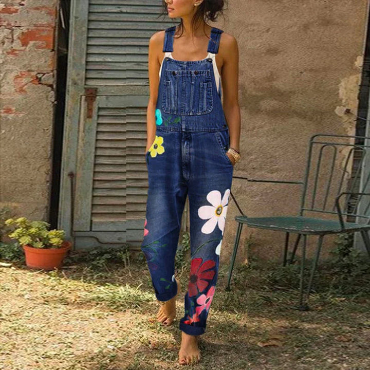 Dames jumpsuit met levendig bloemenpatroon, perfect voor zomerse elegantie. Comfortabel en stijlvol.