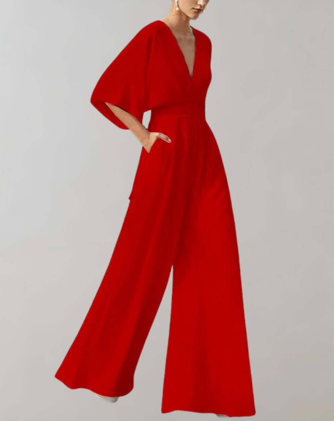 Elegante dames jumpsuit, wijde pijpen, diepe V-hals. Chique en modieuze avondkleding, perfect voor een feestje.