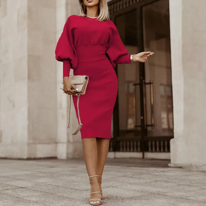 Elegante dames midi jurk met lantaarnmouwen, ideaal voor kantoor. Stijlvolle, comfortabele kleding.