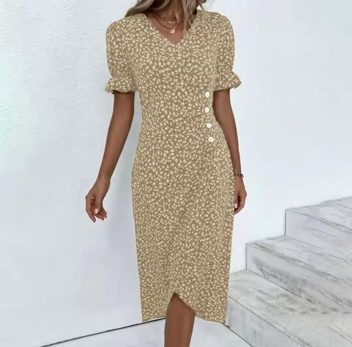 Zomerse dames v-hals midi jurk met bloemenprint. Trendy en comfortabel voor elke gelegenheid.