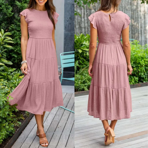 Stijlvolle zomerjurk met vlindermouwen en een casual, maar elegante pasvorm voor vrouwen.