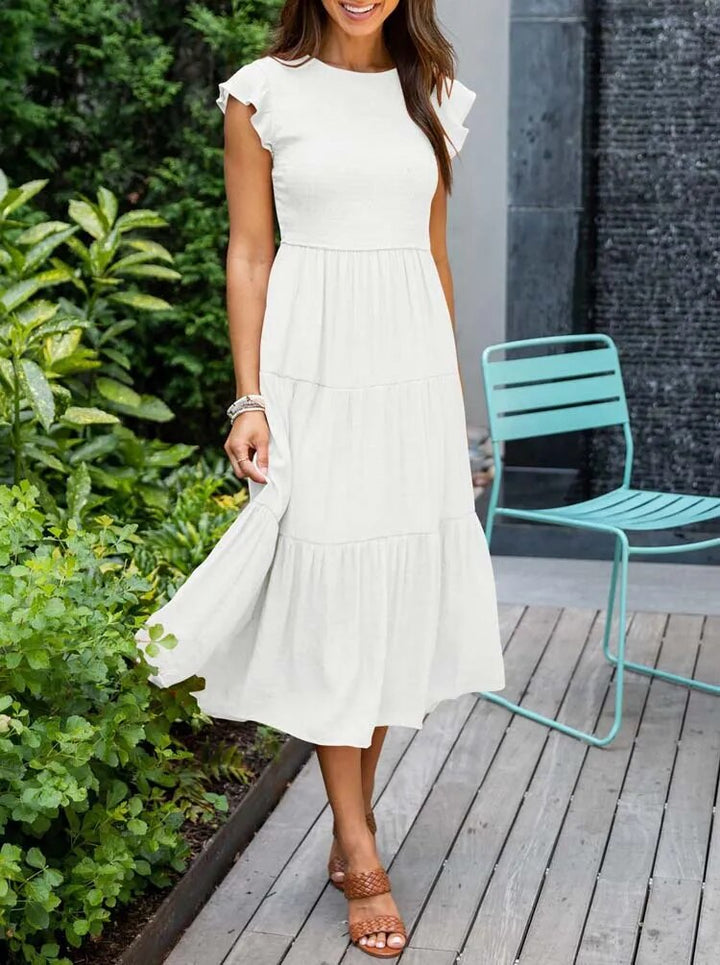 Flatterende damesjurk, midi-lengte, met stijlvolle vlindermouwen, perfect als casual jurk.