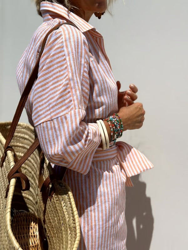 Comfortabele polojurk voor dames, midilengte, 3/4 mouwen en een elegante, casual uitstraling.