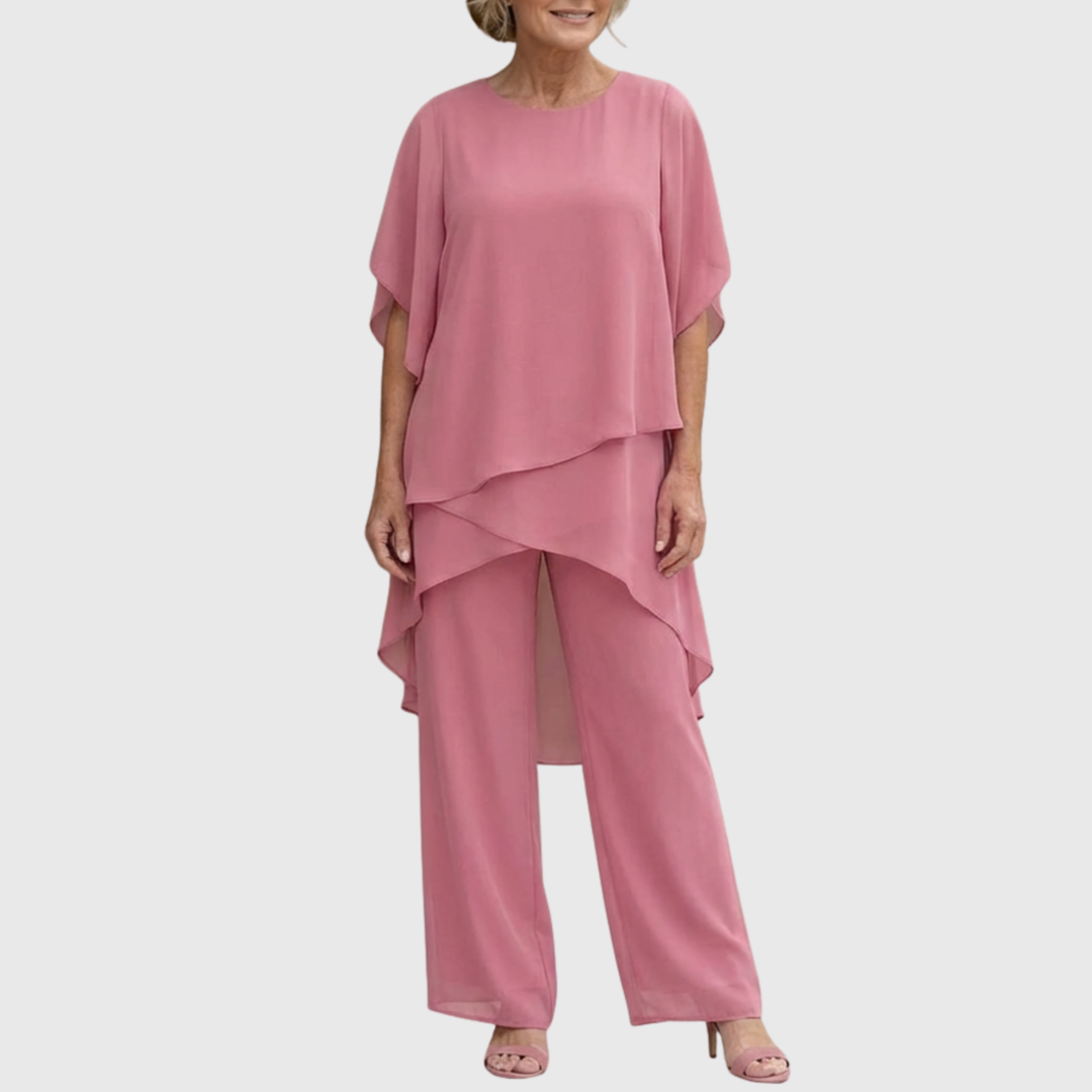 Veelzijdige dames set met asymmetrische draperie en flowy palazzo broek. Geschikt voor casual en elegante looks.