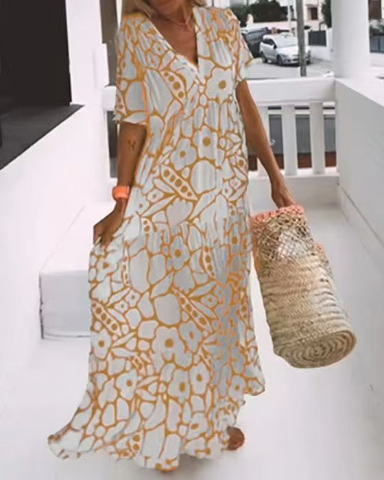 Modieuze Rosalie dames zomer maxi jurk met elegante V-hals, comfortabel en luchtig voor warme dagen.