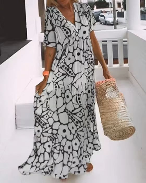 Rosalie elegante V-hals maxi jurk voor dames, een stijlvolle en comfortabele keuze voor elke gelegenheid.