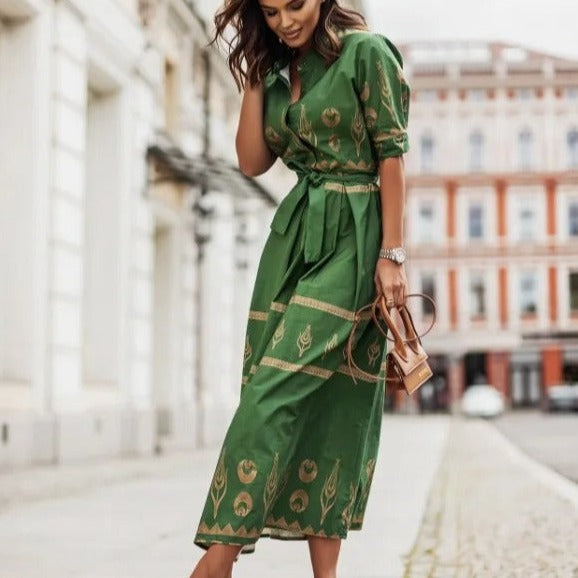 Comfortabele vintage midi zomerjurk voor dames met elegante getailleerde pasvorm, geschikt als dagelijkse of feestjurk.