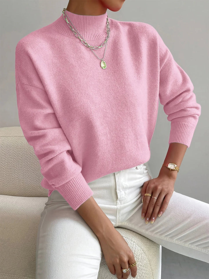 Close-up van de elegante hoge hals van een dames coltrui. Warme winter trui met soepele pasvorm voor dames.