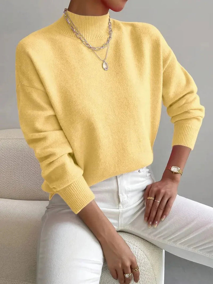 Zachte, gebreide dames coltrui. Comfortabele herfst & winter trui met hoge hals, ideaal voor dagelijkse outfit.