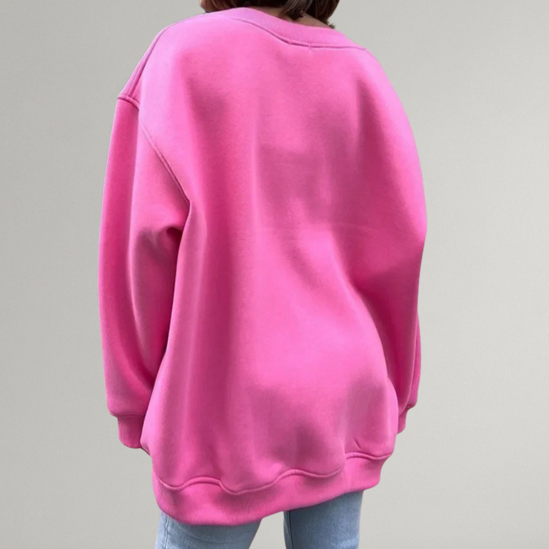 Detailfoto comfortabele oversized dames sweater stof, zacht breisel, ideaal voor herfst/winter casual look.