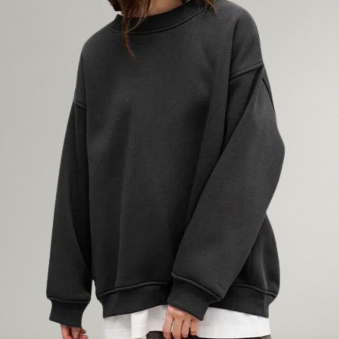 Dames oversized sweater in trendy casual outfit, veelzijdig voor herfst/winter. Comfortabele relaxte pasvorm.