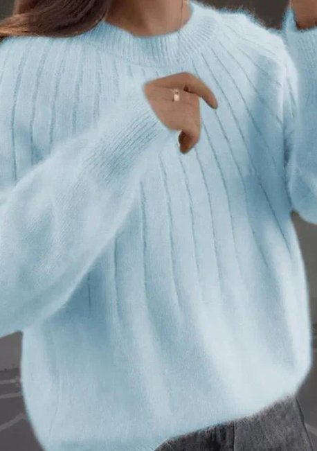 Elegante damessweater met fluffy textuur en ronde hals, een comfortabele keuze voor elke dag.