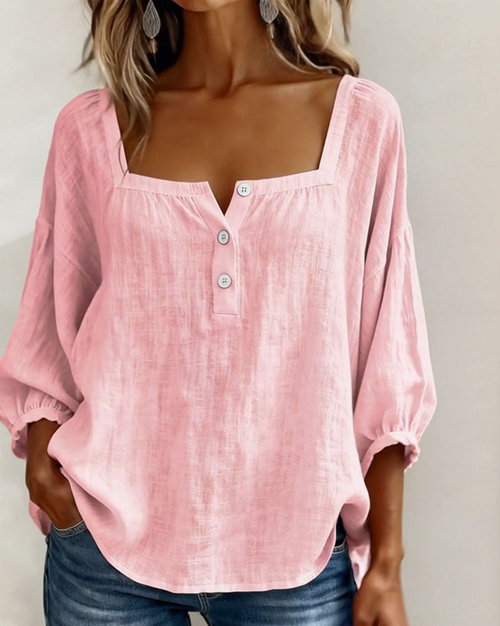 Elegante pofmouwen van deze damesblouse, ideaal voor een casual of chique lente look.