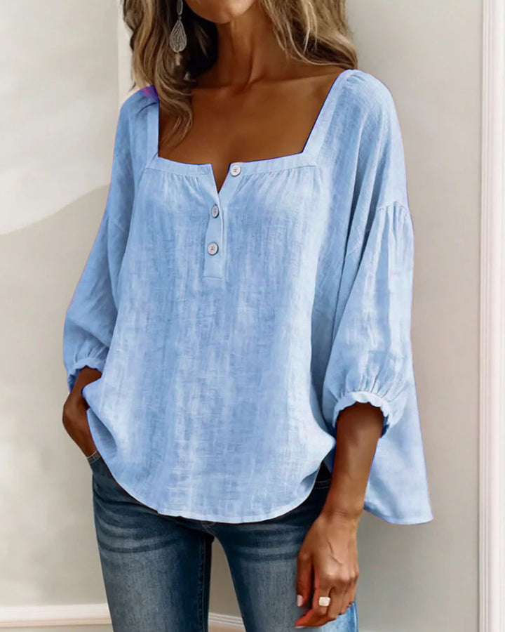 Zachte, ademende stof van de damesblouse met pofmouwen en vierkante hals; comfortabel voor zomer en lente.