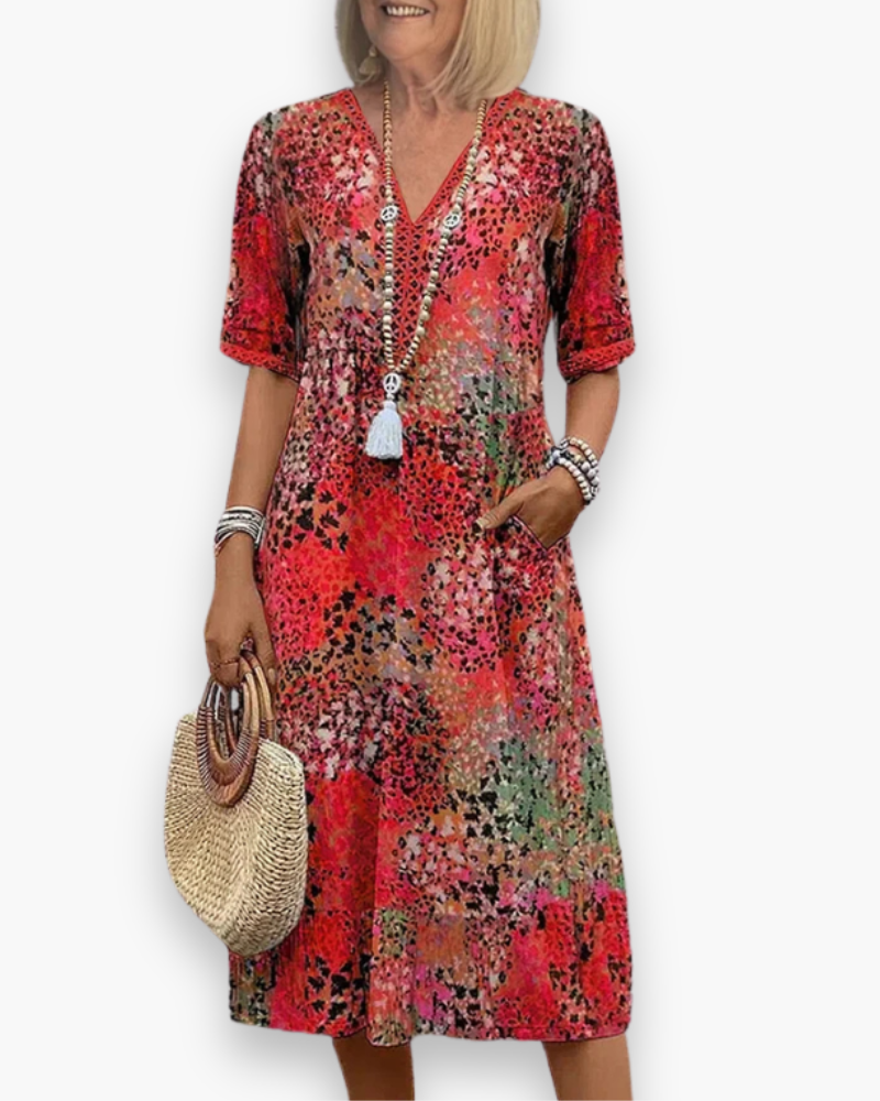 Elegante dames midi-jurk met V-hals, perfect voor dagelijks comfort en een charmante zomerlook.