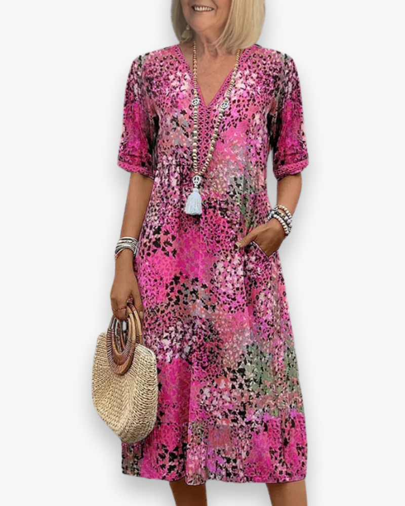 Comfortabele midi-jurk voor dames, met elegante V-hals. Een perfecte keuze voor casual en dagelijkse zomerkleding.