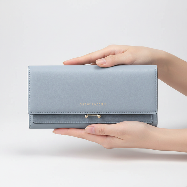 Modieuze damesportemonnee van kunstleer, elegant accessoire met ruimte voor pasjes, geld en telefoon.
