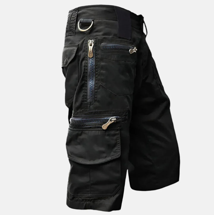 Heren cargoshorts met knielange pasvorm en meerdere functionele zakken, ideaal voor zomerse outdoor avonturen.