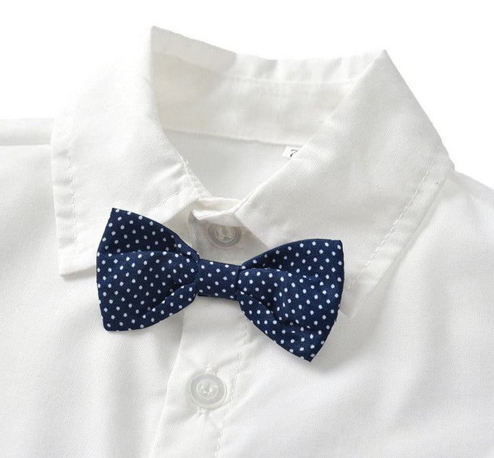 Elegante baby combiset met knoopsluiting, makkelijk aan te trekken.