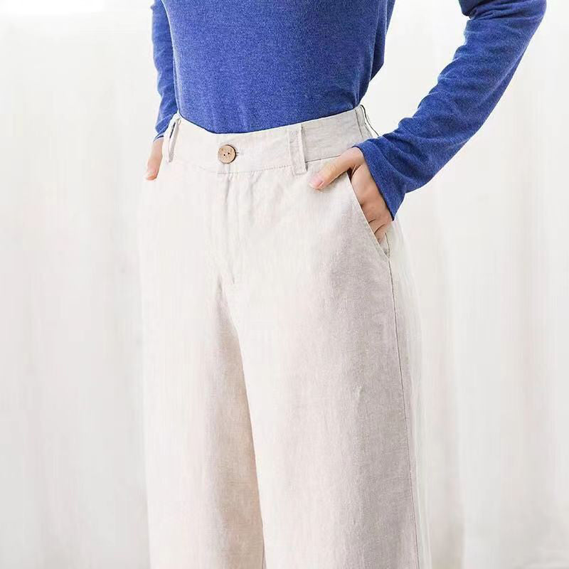 Moderne dames pantalon Diana in beige, met wijde pijpen en hoge taille, een trendsettende broek die comfort en stijl combineert.