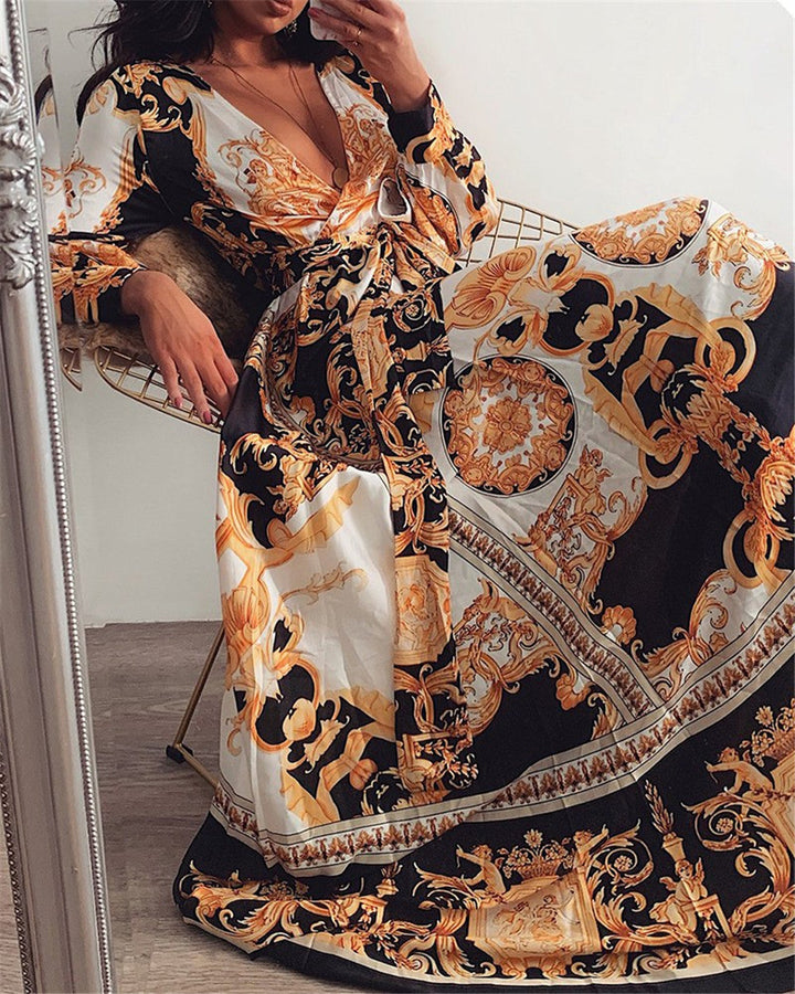 Gele wikkeljurk dames, zomerse boho jurk met split. Stijlvolle maxi jurk met v-hals, perfect voor elk feest.