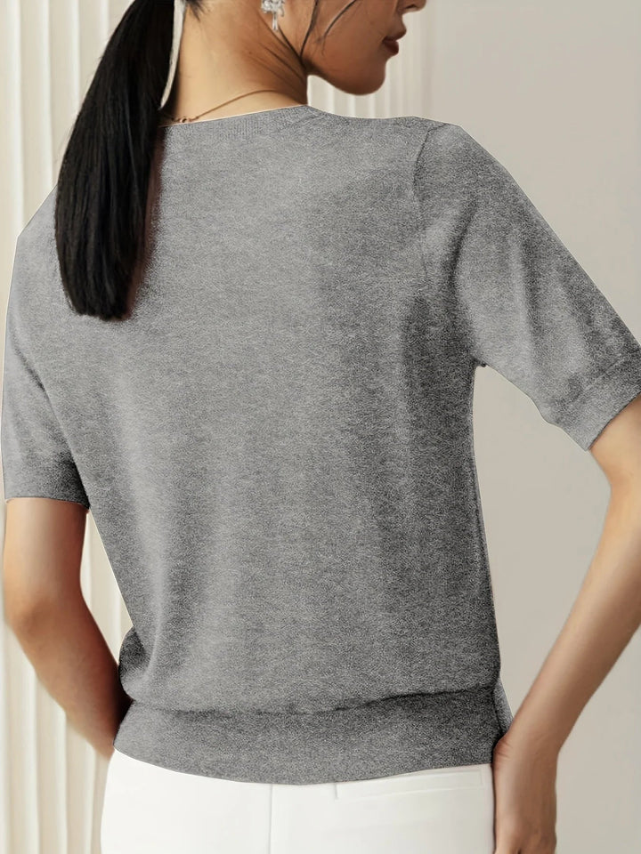 Losvallende dames voorjaarstrui Mira, met korte mouwen voor een relaxte, trendy look.